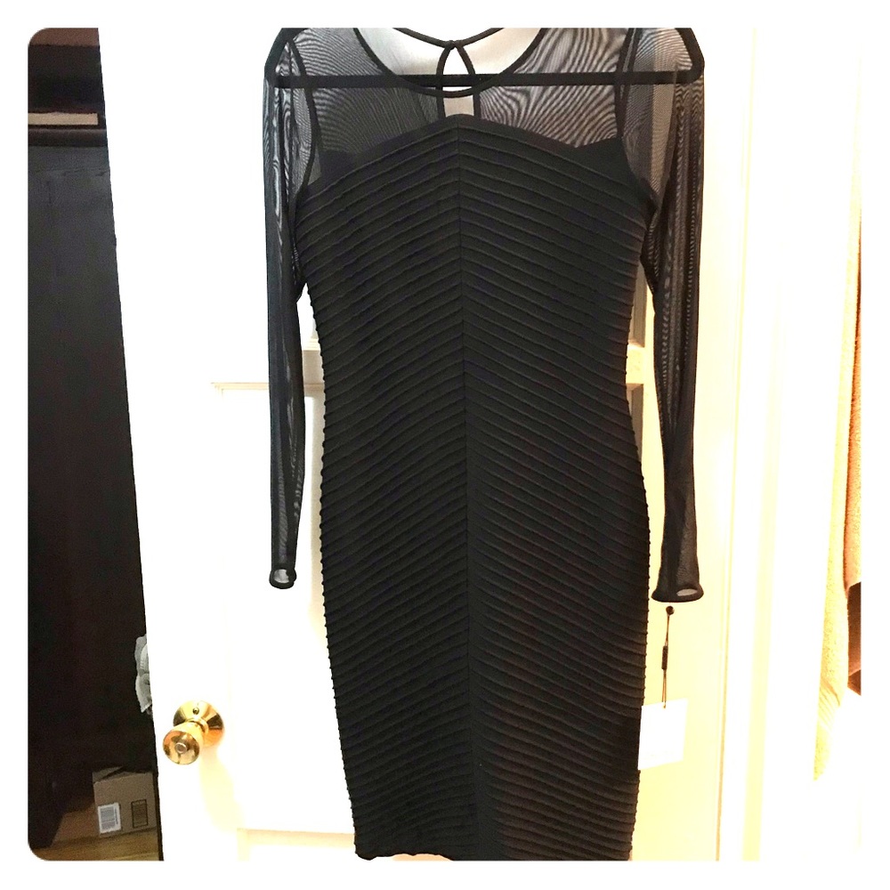 Chic form-fitting black Calvin Klein dress